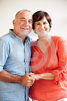 Portrait Of Happy Middle Aged Hispanic Couple