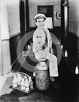 Portrait of happy milkman