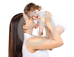 Portrait happy mom and baby on a white background, family, tenderness