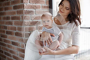 Portrait of happy mother and baby