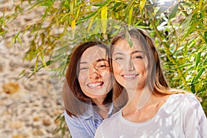 Portrait of happy mother and her adult daughter