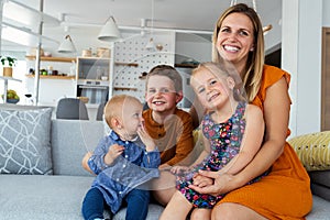 Portrait of a happy mother and her children having fun together