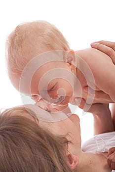 Portrait of happy mother with joyful baby