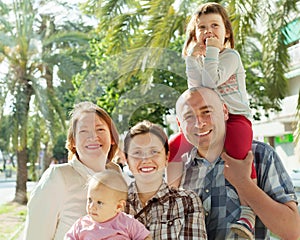 Portrait of happy multigeneration family in park