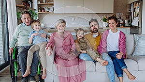 Portrait of happy multigenerational family in modern house.