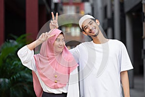 portrait happy muslim teen man and women couple lover friend standing together enjoy fun lifestyle outdoors