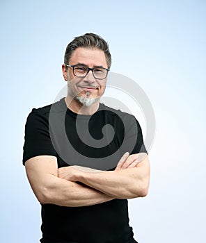 Portrait of happy older casual man on white smiling