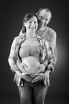 Portrait of a happy pregnant couple