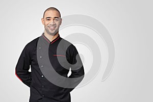 Portrait of happy professional cook isolated