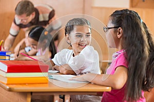 Portrait of happy pupil at lesson