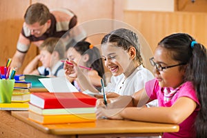 Portrait of happy pupil at lesson