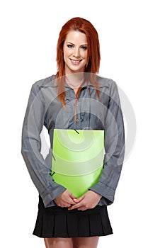 Portrait of a happy redhead woman with portfolio