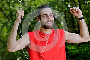 portrait happy runner listening to music