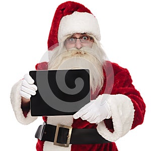 Portrait of happy saint nick presenting blank screen