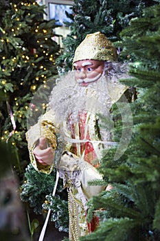 Portrait of happy Santa Claus holding sack with gifts