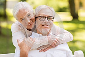 Portrait of happy senior couple at park