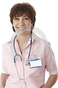 Portrait of happy senior female doctor