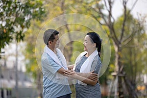 Portrait of Happy senior sports couple outdoors running