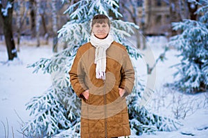 Portrait of happy senior woman enjoying winter walk