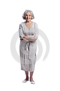 Portrait of happy senior woman wearing light dress