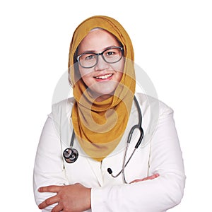 Portrait of happy smiling Asian muslim woman wearing hijab and suite. Confidence female doctor with crossed arms isolated on white