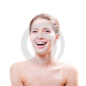 Portrait of happy smiling beautiful young attractive woman with big blue eyes on white background