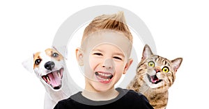 Portrait of happy smiling boy with a dog Jack Russell Terrier and a cat Scottish Straight