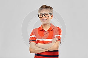 Portrait of happy smiling boy in eyeglasses