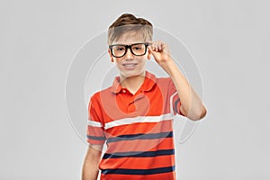 Portrait of happy smiling boy in eyeglasses