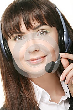 Portrait of happy smiling cheerful support phone operator in headset