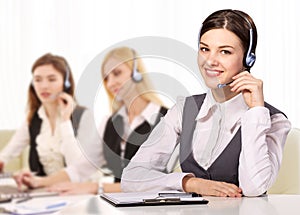 Portrait of happy smiling cheerful support phone operator in headset