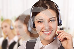 Portrait of happy smiling cheerful support phone operator in headset