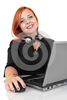 Portrait of happy smiling cheerful young support phone operator in headset with laptop
