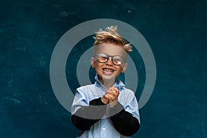 Portrait of happy smiling child with eyeglasses