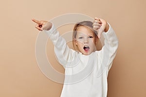 Portrait of happy smiling child girl joy posing emotions fashion childhood unaltered