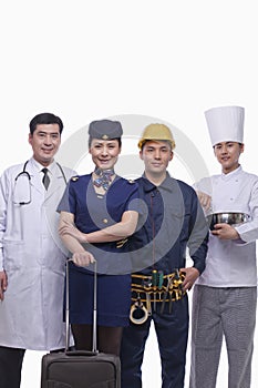 Portrait of Happy and Smiling Doctor, Air Stewardess, Construction Worker, and Chef- Studio Shot