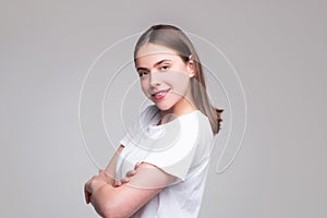 Portrait of happy smiling girl. Cheerful young beautiful girl smiling laughing, studio isoalted background.