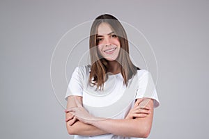 Portrait of happy smiling girl. Cheerful young beautiful girl smiling laughing, studio isoalted background.