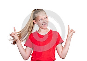 Portrait of a happy smiling girl in a red T-shirt raising her hands up in a sign, isolated on a white background