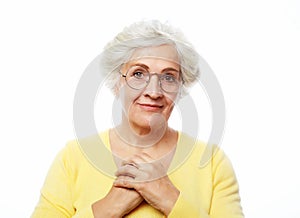 Portrait of happy smiling mature woman over white background.