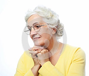 Portrait of happy smiling mature woman over white background.