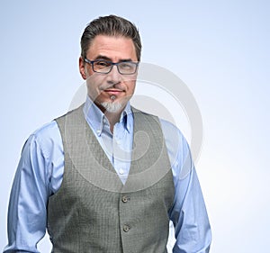 Portrait of happy smiling mid adult businessman on white