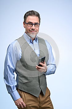 Portrait of happy smiling mid adult businessman on white