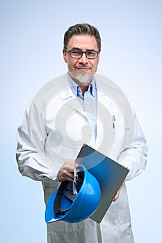 Portrait of happy smiling mid adult engineer on white