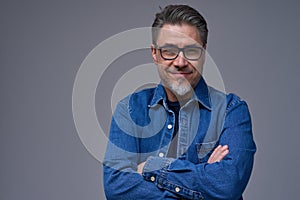 Portrait of happy smiling mid adult man on white