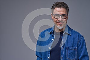 Portrait of happy smiling mid adult man on white