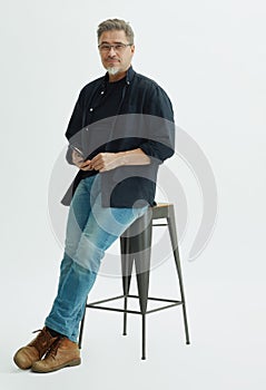 Portrait of happy smiling mid adult man on white