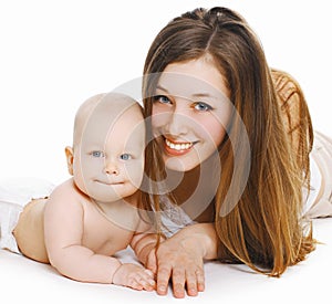 Portrait of happy smiling mother and baby playing together over white background