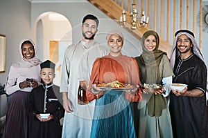 Portrait of a happy, smiling and positive muslim family celebrating Ramadan together, spending the day embracing