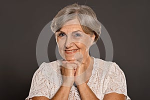 Portrait of happy smiling senior woman posing